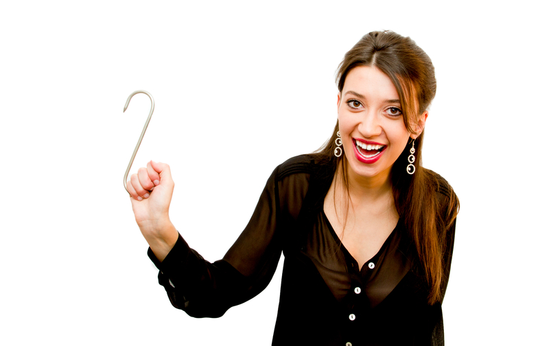 http://www.dreamstime.com/royalty-free-stock-photography-woman-holding-hook-image21075567